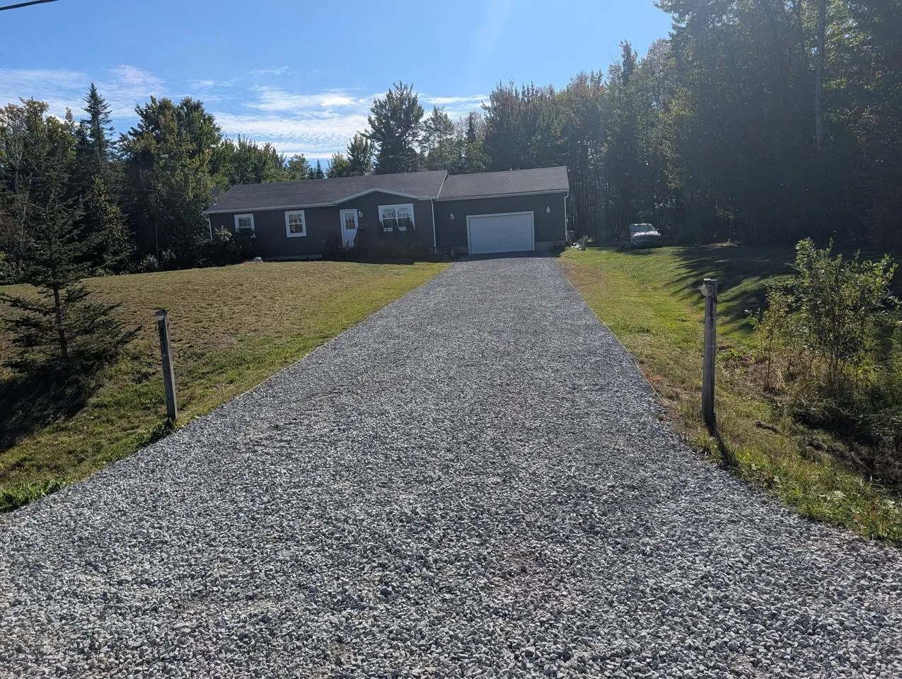 The same driveway finished with fresh crushed rock